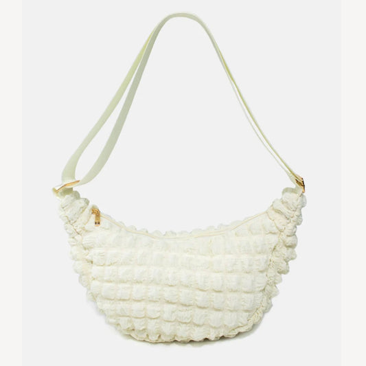 Kind Bag crossbody bag in cream waffle texture
