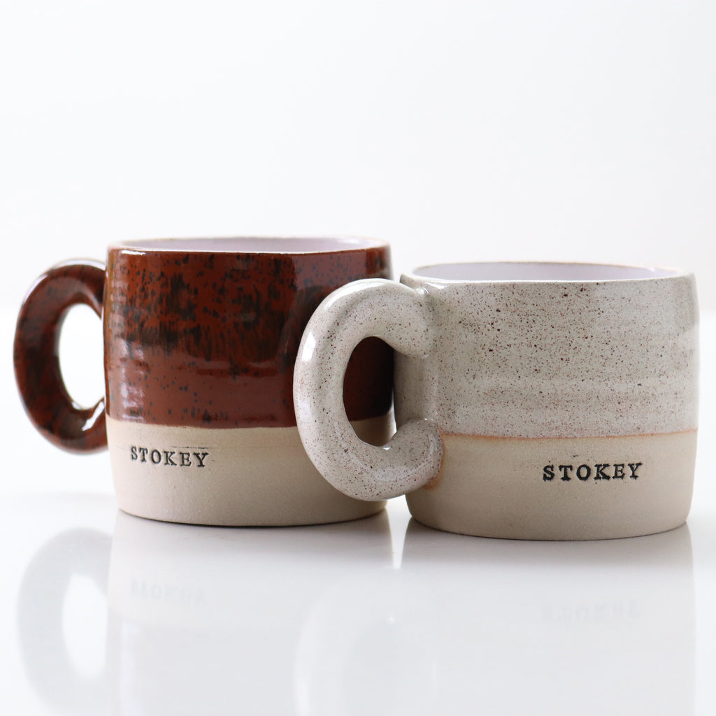 Brown and grey speckled 'Stokey' mugs handcrafted by Lesley McShea