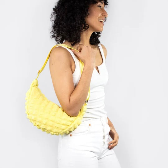 Kind Bag crossbody bag in cheerful yellow waffle fabric – retro-inspired colour in a sustainable sling bag