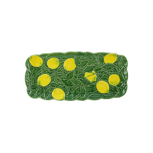 Green ceramic platter with yellow lemon designs by Bordallo Pinheiro on a white background