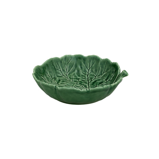Green leaf-shaped bowl by Bordallo Pinheiro on a white background