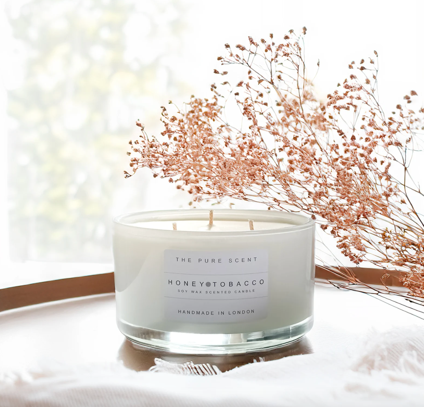 the pure scent candle three wick white glass honey and tobacco