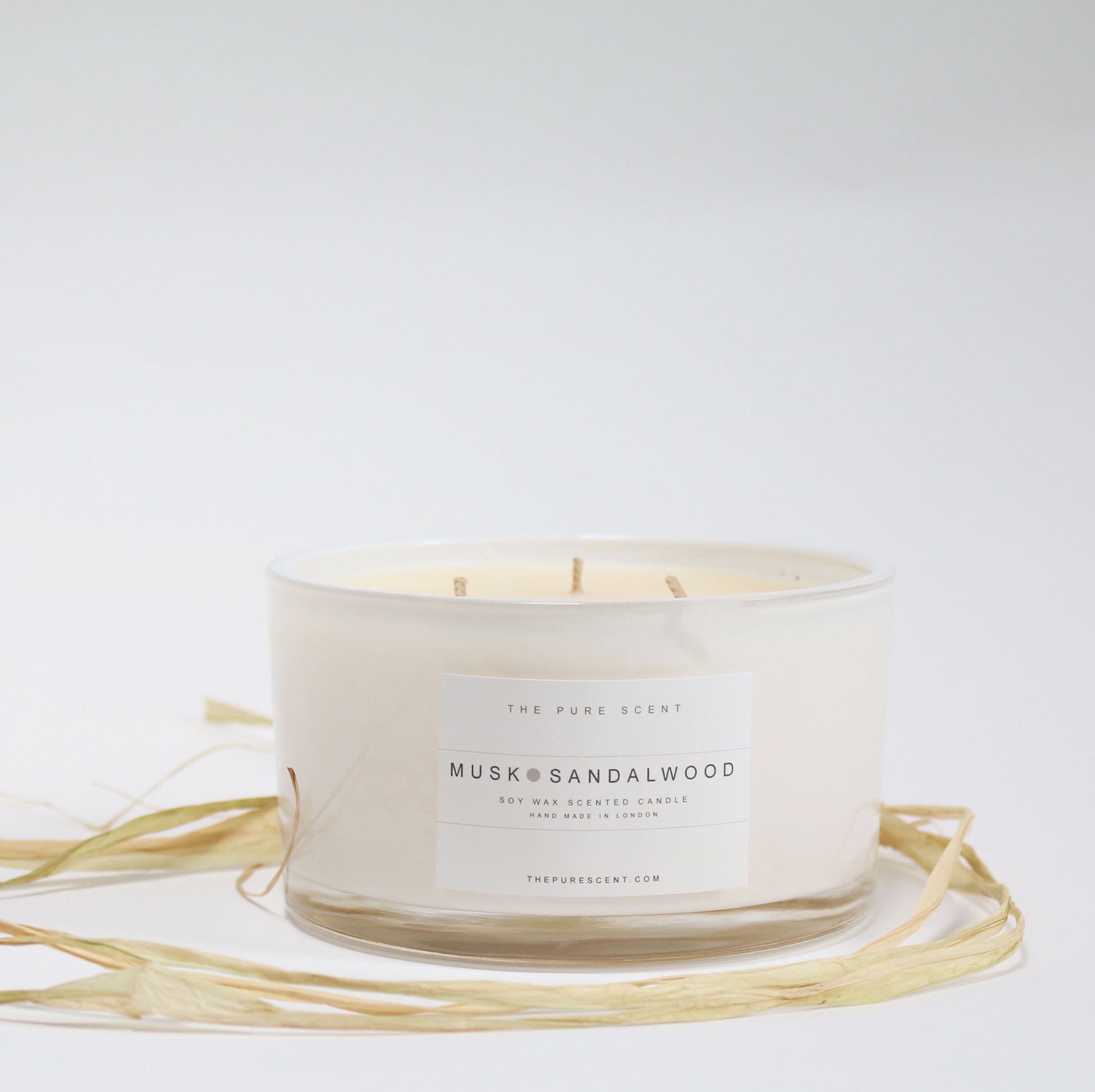 Musk & Sandalwood 3-wick candle by The Pure Scent in white glass
